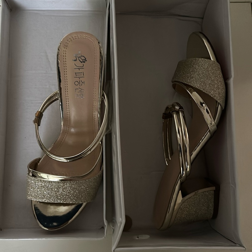 Brand new golden sandals.
